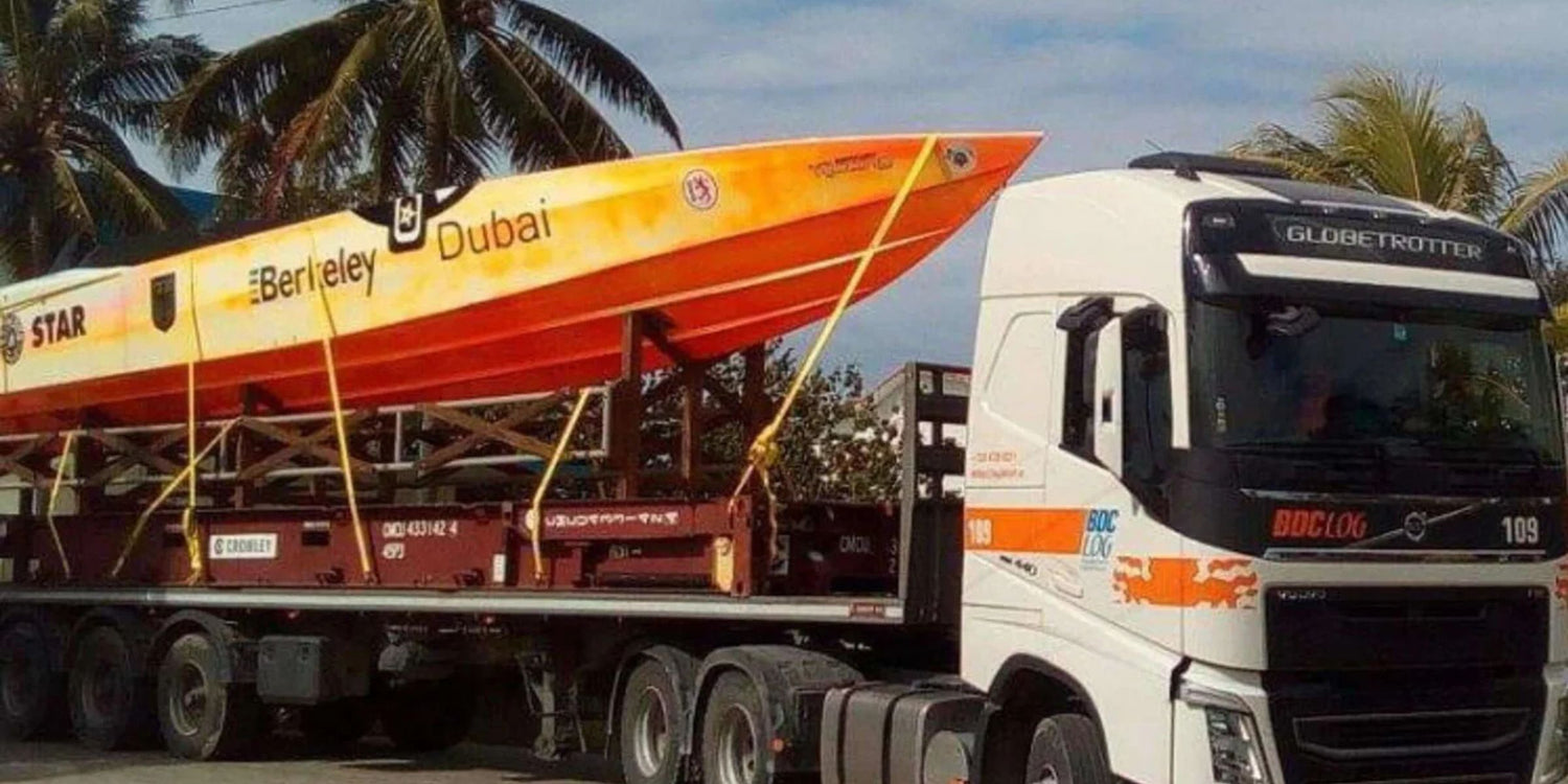Globetrotter Roger Klüh's orange powerboat APACHE STAR loaded on a transport truck.