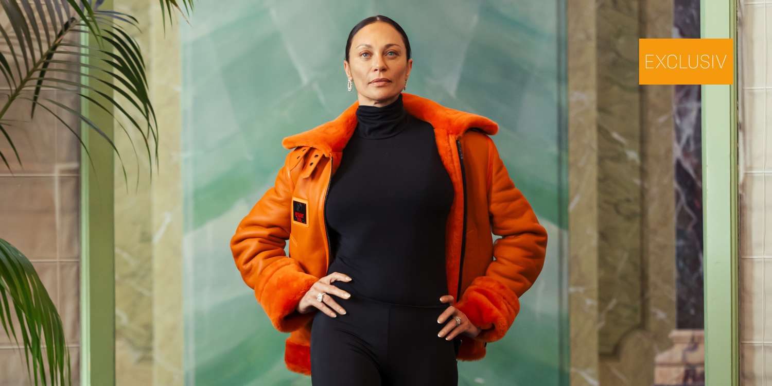 Lilly Becker stuns in bold orange jacket FLAMING AVIATOR by APACHE STAR at Paris Fashion Week show