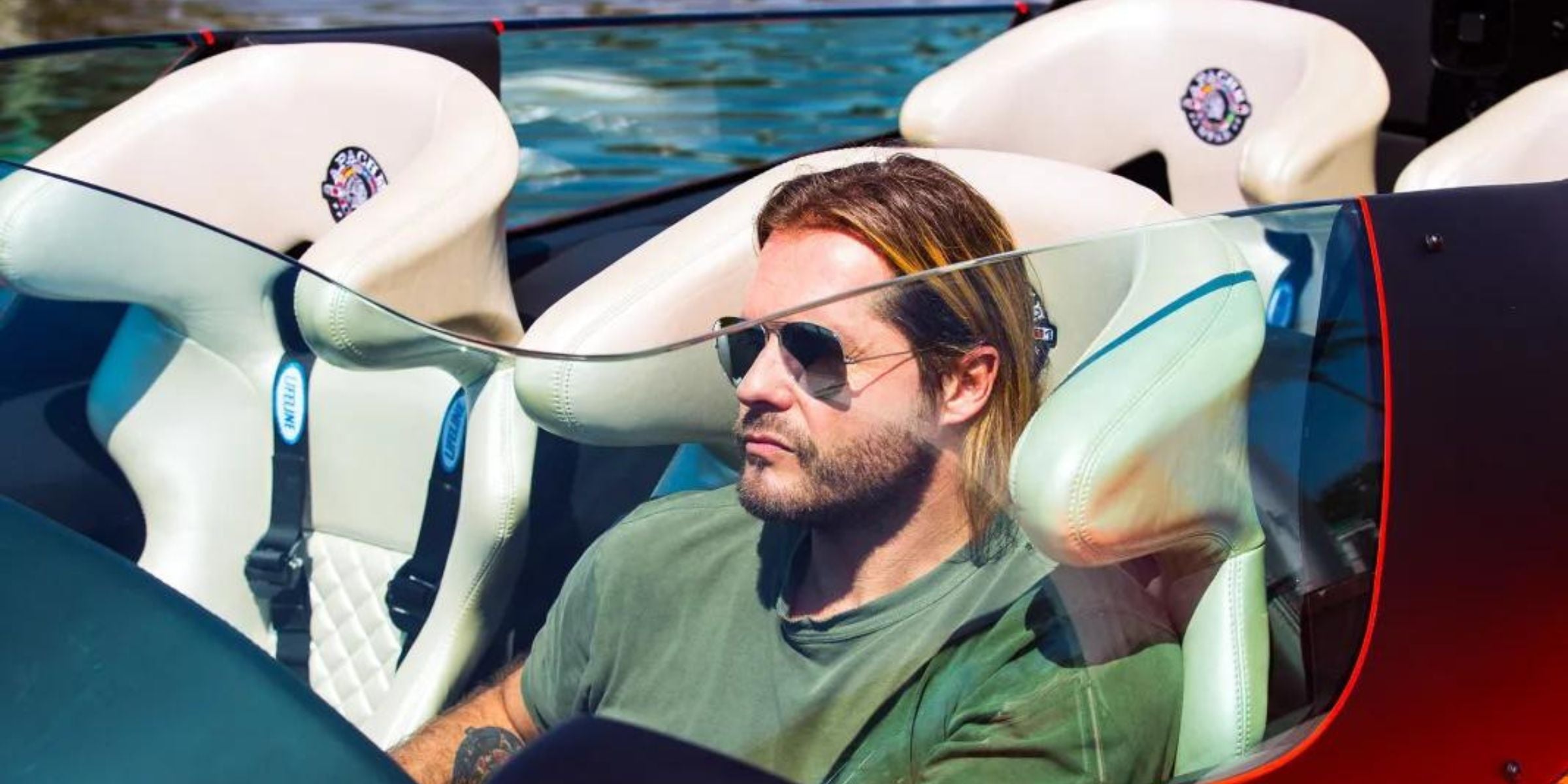 Roger Anthony Cassius Klüh in the captains pilot seat of APACHE STAR powerboat