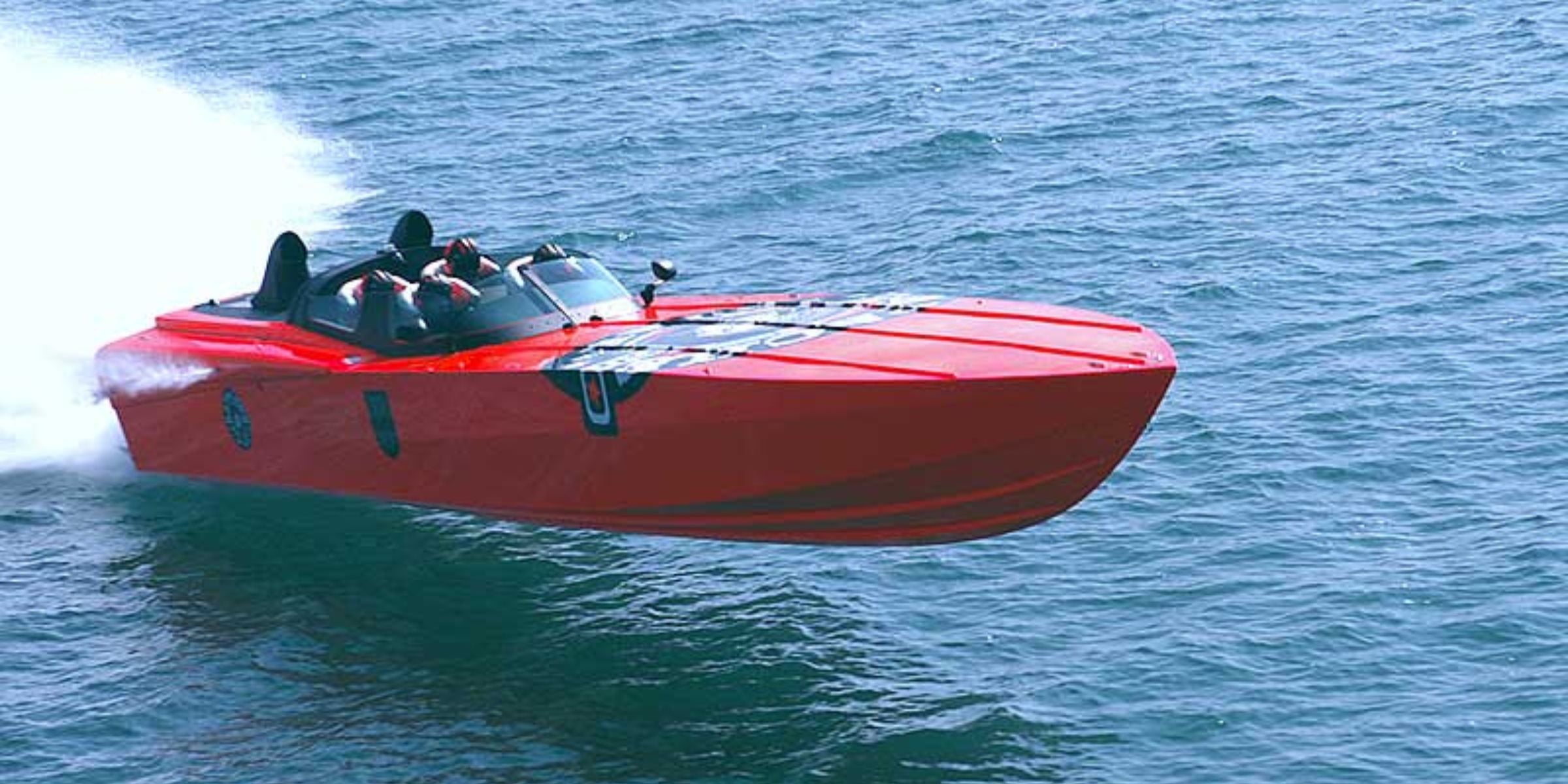 High-speed orange powerboat APACHE STAR skimming ocean surface at record pace