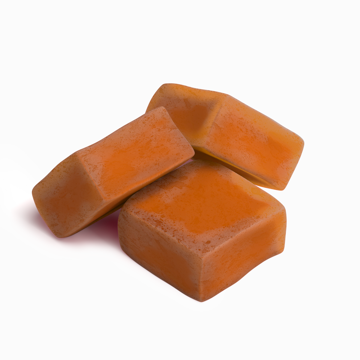 Close-up of three orange flavored adaptogen mushroom gummies — one daily serving