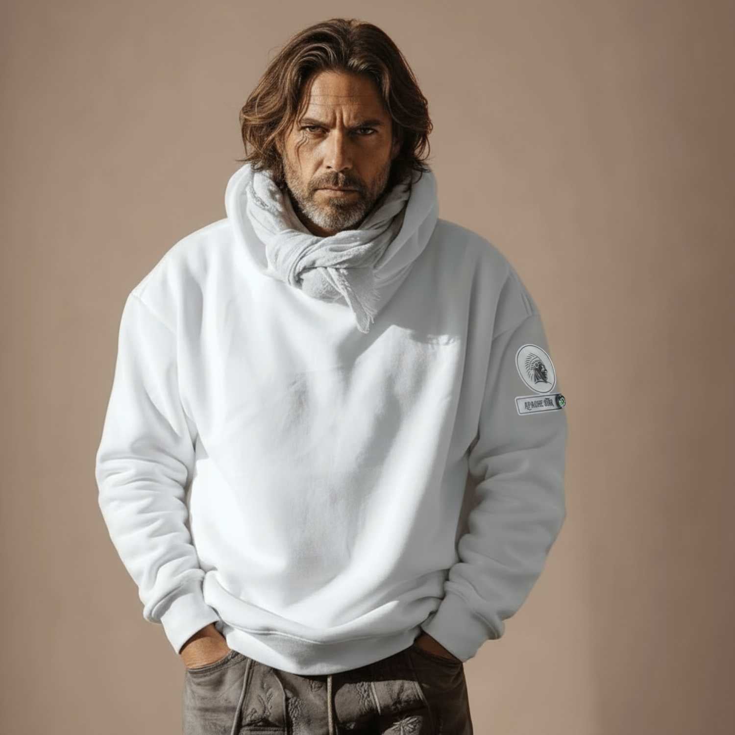 Bearded man in white hoodie with logo, studio shot, fashion model