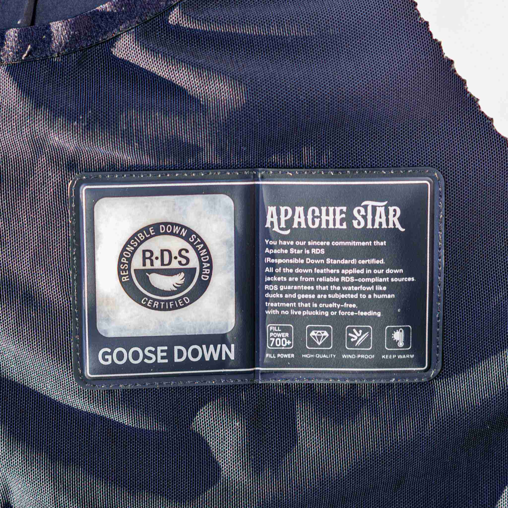 RDS certified goose down label inside Trident Trooper Down Coat by APACHE STAR, highlighting sustainable and ethical insulation standards.