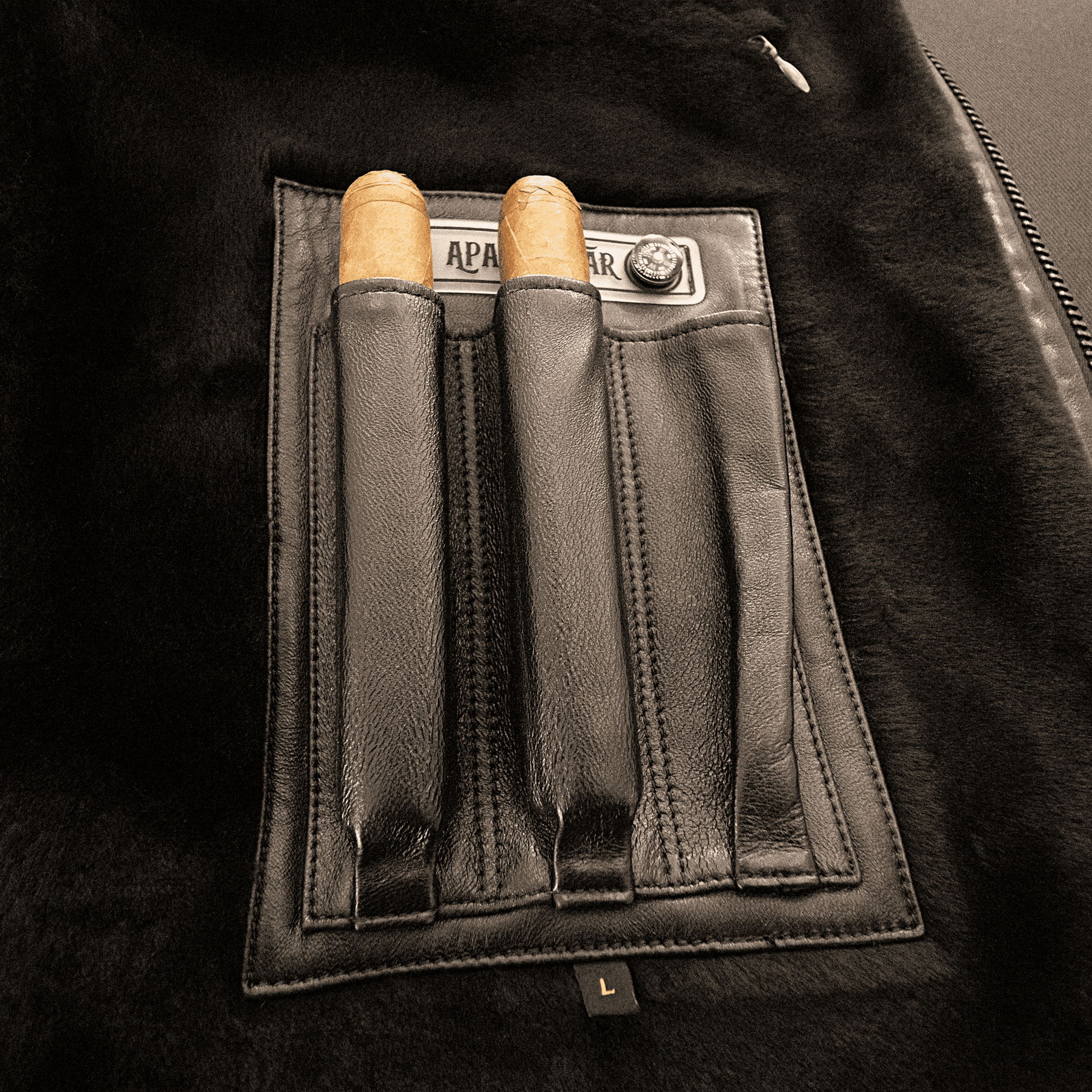 Interior cigar holder pocket of PHANTOM FALCON Nappa Lamb Pilot Jacket by APACHE STAR, showcasing luxury and functionality.