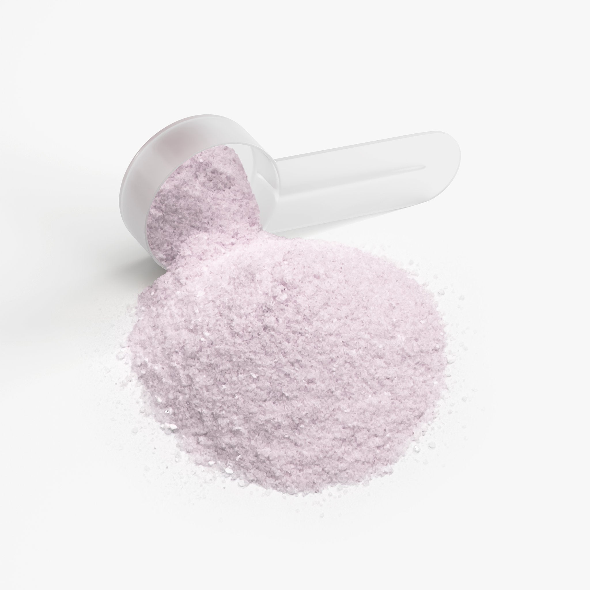 Close-up of pink Yuzu Energy Powder by APACHE STAR in a scoop. Vegan, non-GMO supplement with caffeine, L-theanine, and electrolytes for clean energy and focus.