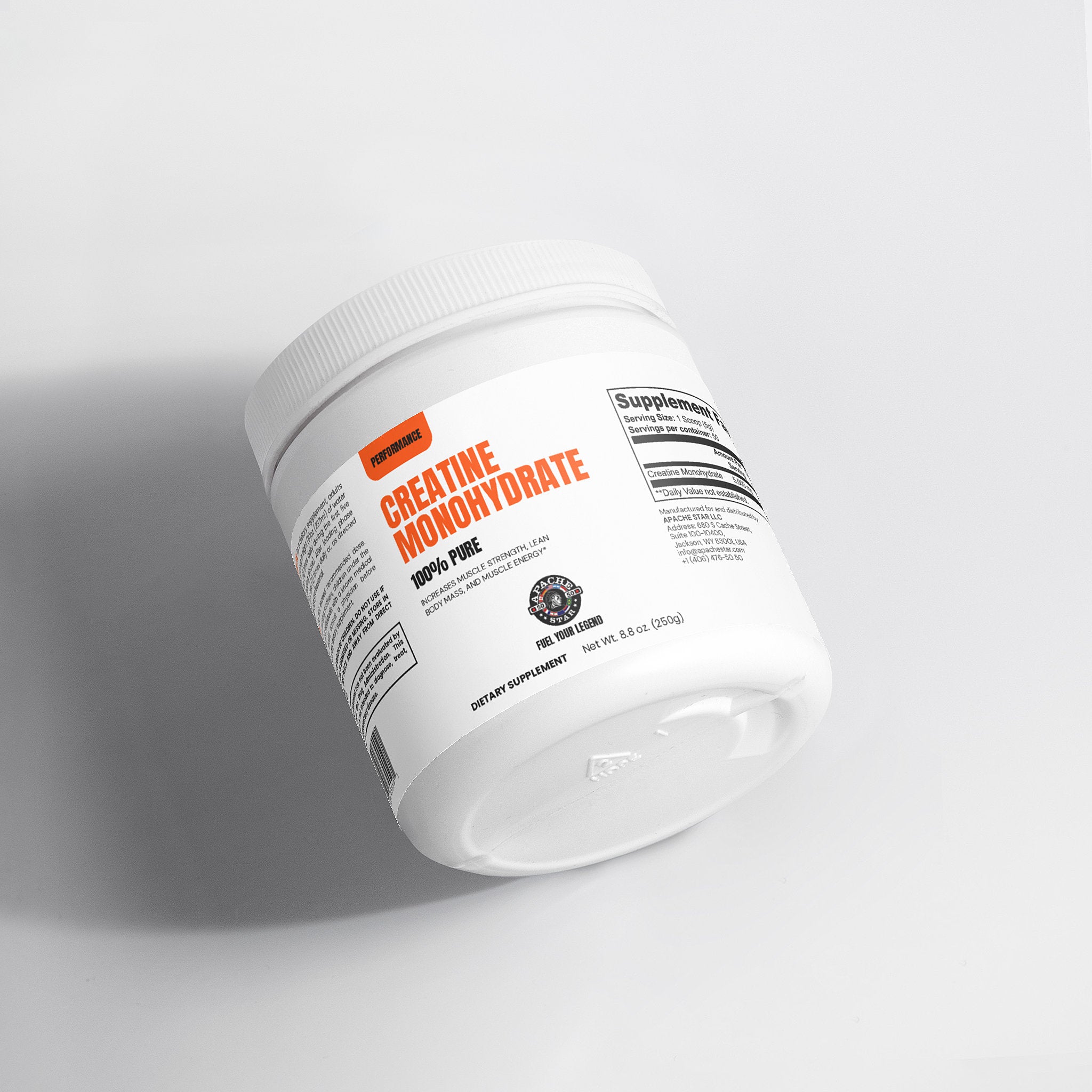 White creatine monohydrate supplement jar with black and orange label