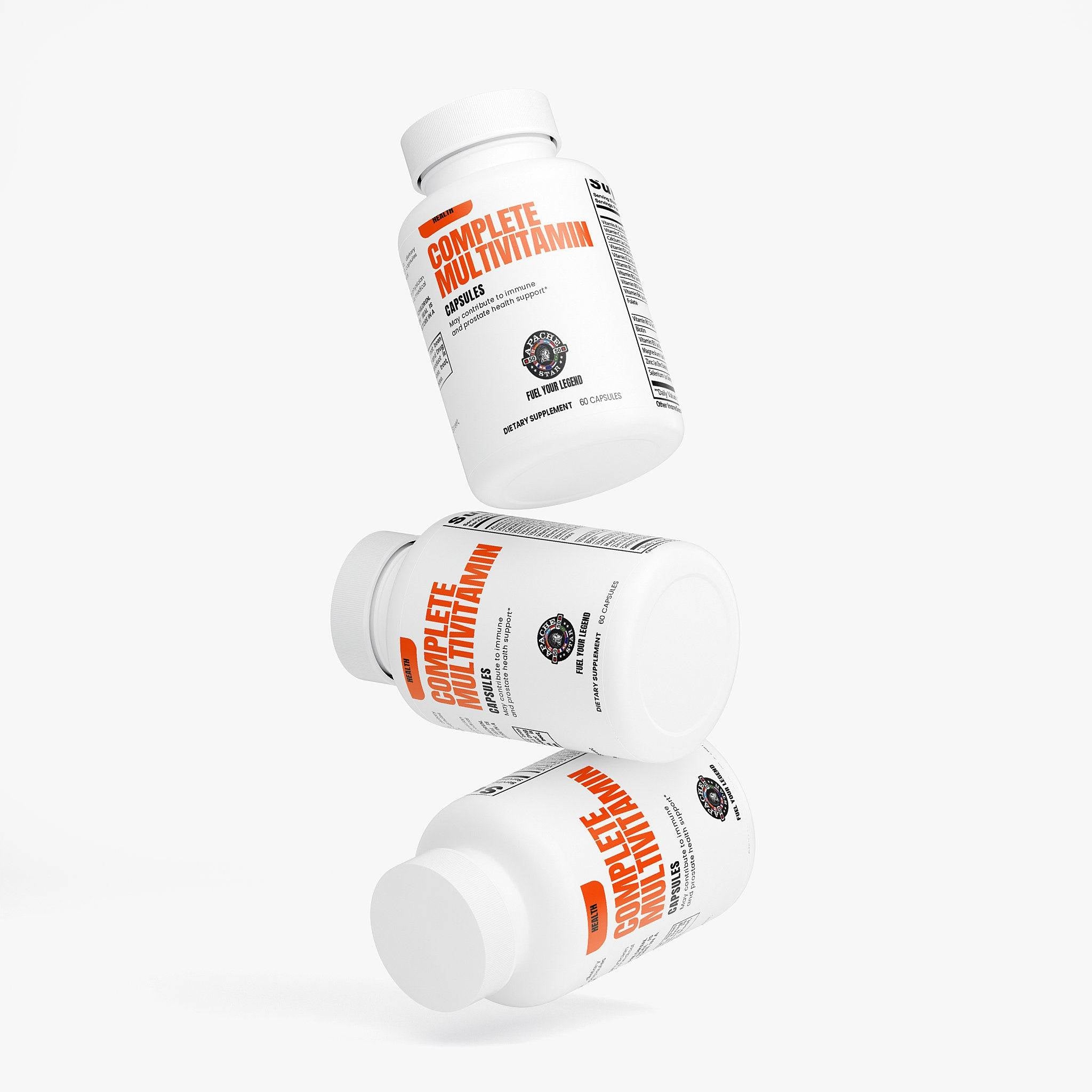 White bottle of multivitamin capsules with orange label and capsules spilling