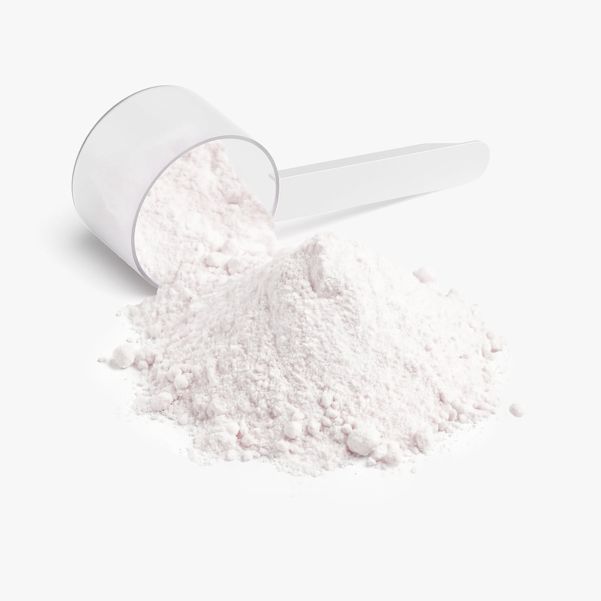 Dosing scoop filled with honeydew watermelon BCAA powder next to a loose powder pile