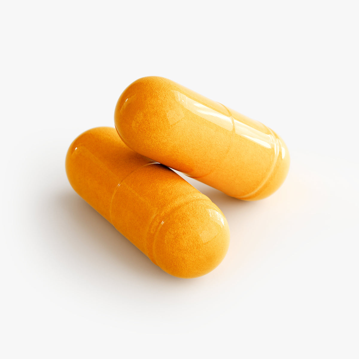 Close-up of orange CoQ10 ubiquinone capsules