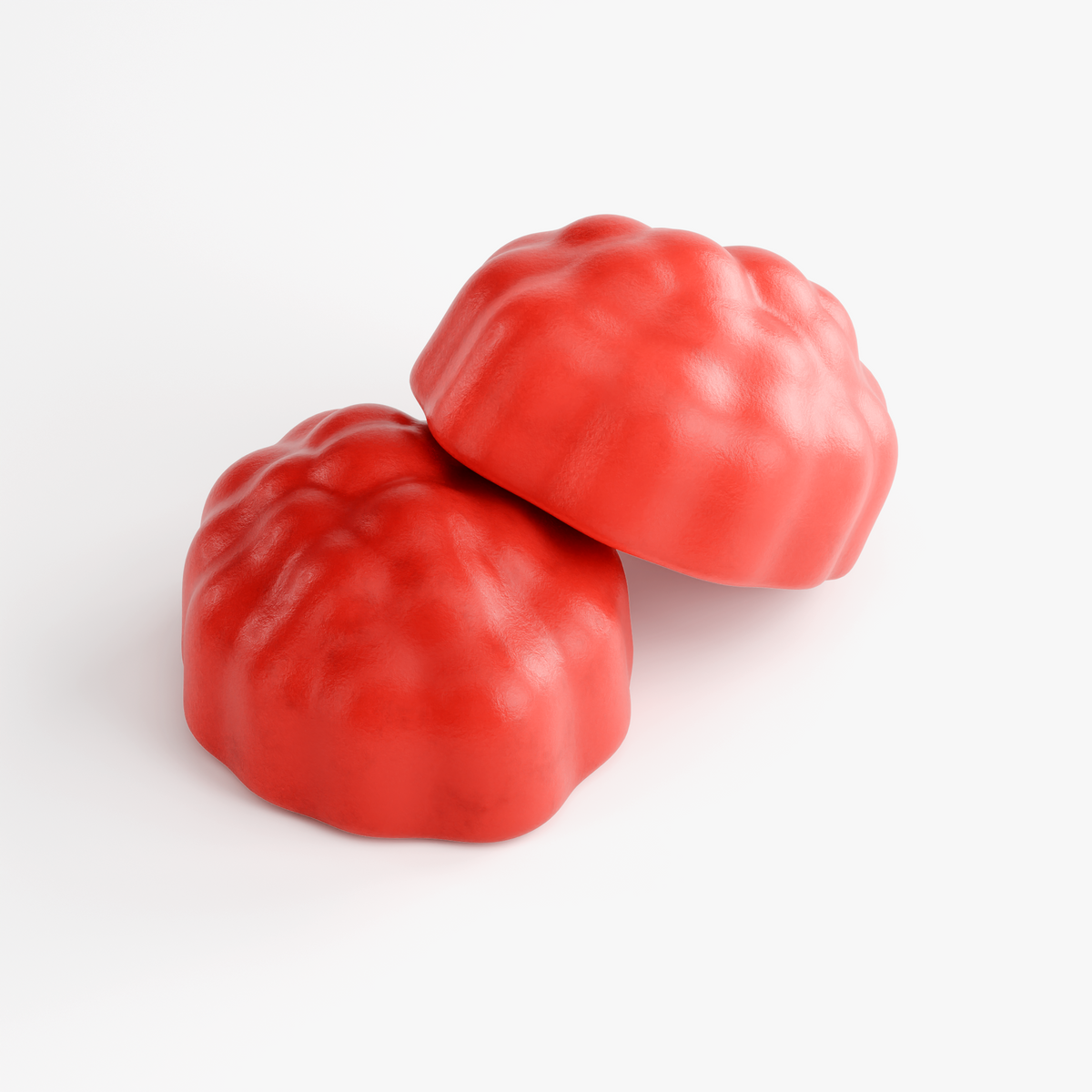 Close-up of two red passion fruit flavored Hair, Skin & Nails gummies — one daily serving