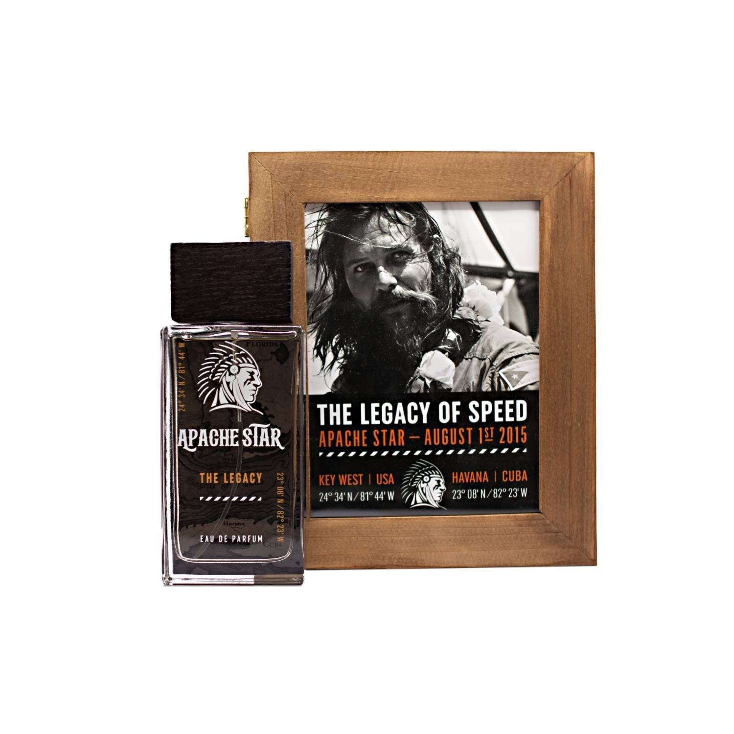 APACHE STAR® The Legacy Eau de Parfum 100ml displayed with framed photo of world record setter Roger Klüh and coordinates, highlighting its adventurous woody scent for men.