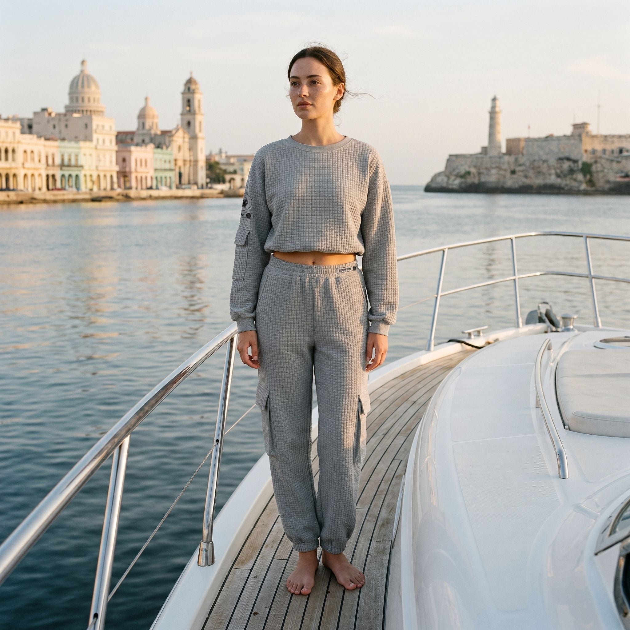 Model wearing the APACHE STAR® Havana waffle cargo set in Light Grey at the Havana waterfront