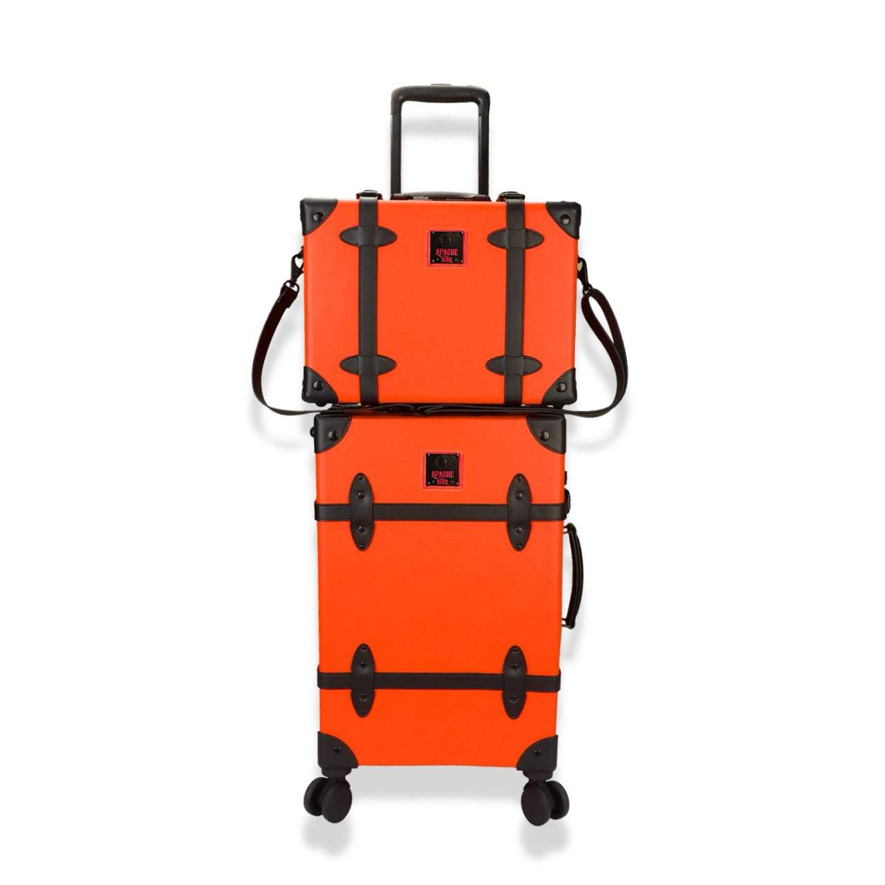 Stacked APACHE STAR® 13" and 20" Signature Orange vintage suitcases with leather straps and spinner wheels, ideal for stylish coordinated travel.