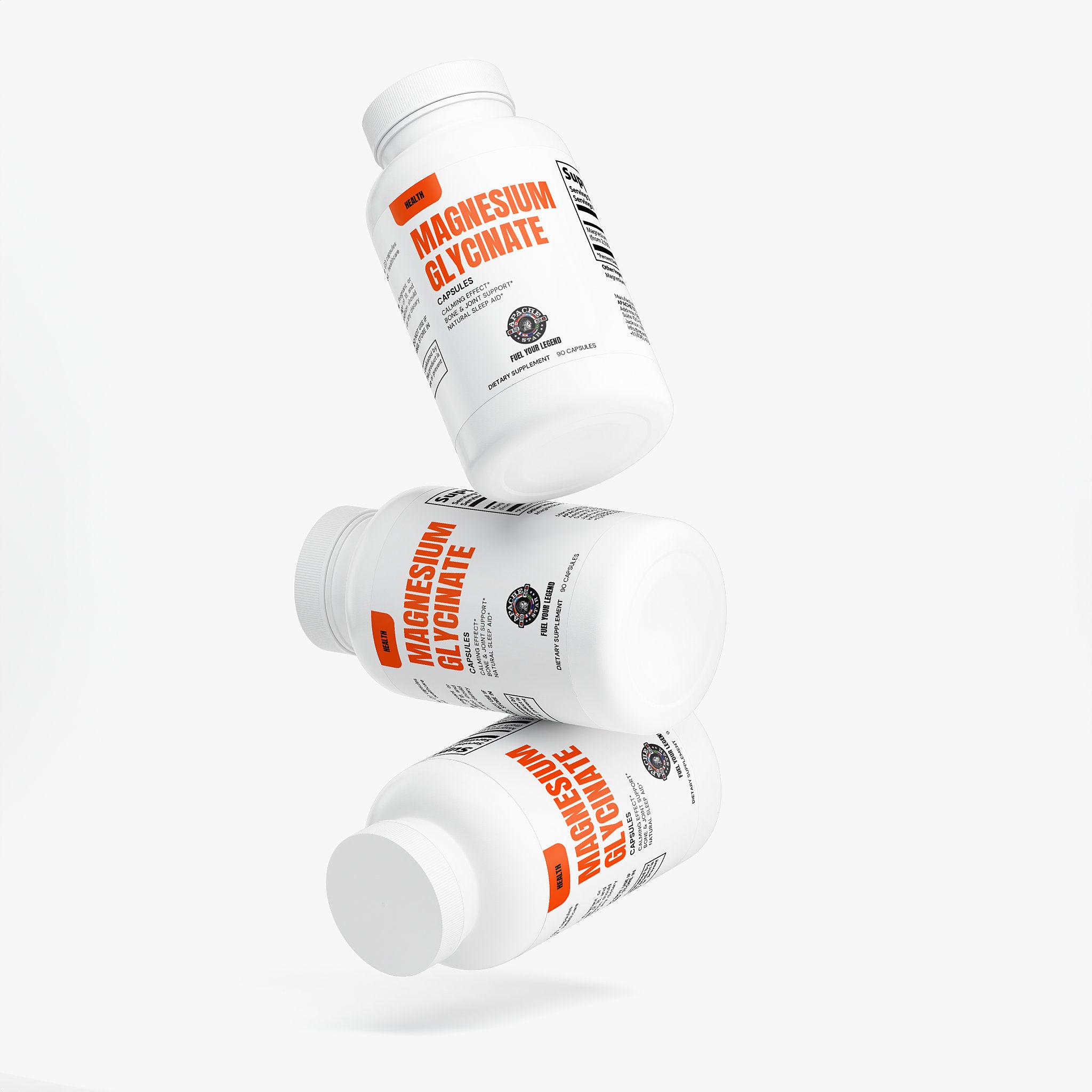 White capsules spilling from a supplement bottle with orange label and black capsules inside