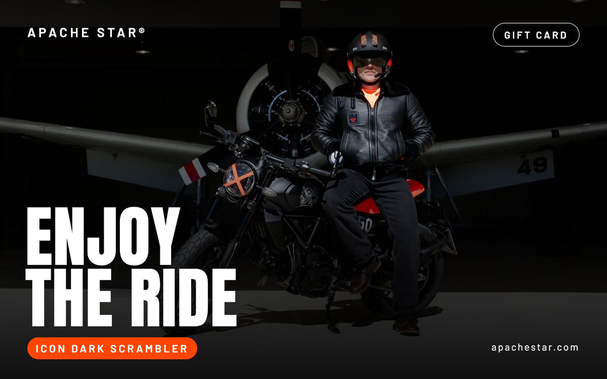 APACHE STAR® gift card, design Enjoy the ride: a rider on the black motorcycle in a hangar