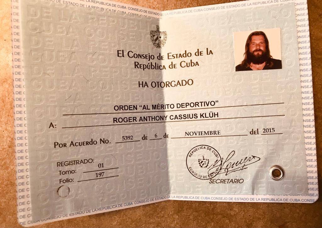 Orden al Mérito Deportivo — personal Carné de Condecorado issued by the Council of State of the Republic of Cuba to Roger Anthony Cassius Klüh, signed November 6, 2015